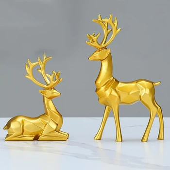 2 db ülő álló szarvas szobrok aranygyanta Kivételes rénszarvas szobrok Egészítsd ki az otthoni dekorációdat